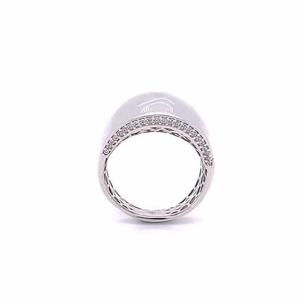 Anello in oro bianco con zirgoni laterali