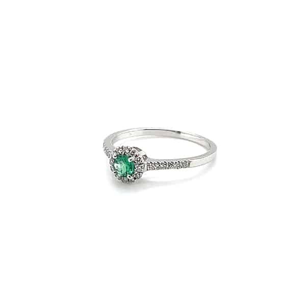 Ring with round emerald and diamonds