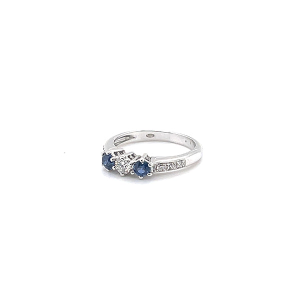 Trilogy ring with sapphire and diamonds