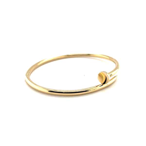 Rigid 18kt gold nail-shaped bracelet