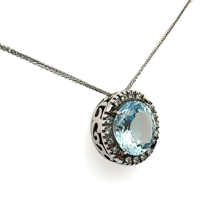 Ciondolo in oro con acqua marina