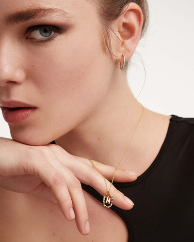 Co Letter M gold