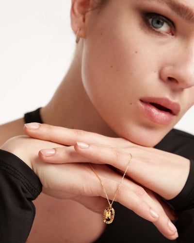 Co Letter M gold