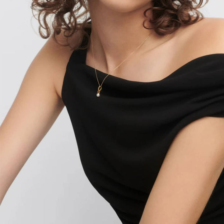 pe01-080-u  ciondolo con perla in argento dorato