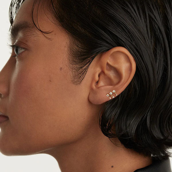 Sol single gold earrings