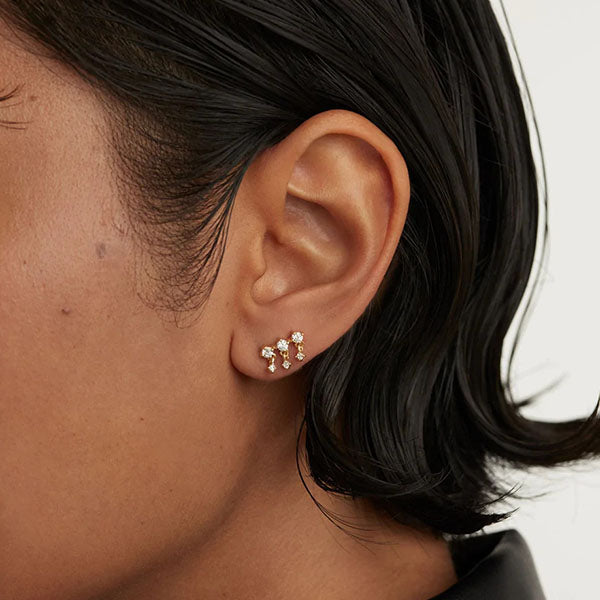 Sol single gold earrings