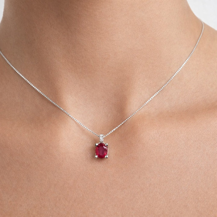 Punto luce con rubino e diamanti